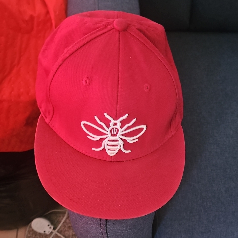 Red Cap with Embroidered Bee Design